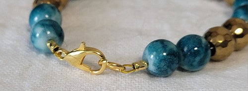 Teal and White Swirl and Gold Bracelet
